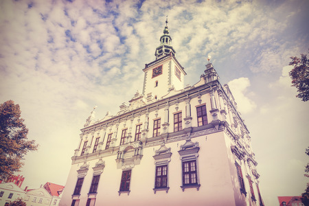 Vintage retro filtered photo of town hall in Chelmno, Poland.の写真素材