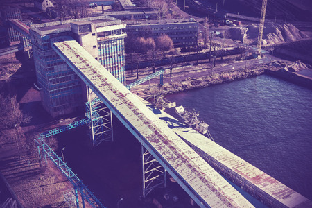 Retro vintage filtered picture of old industrial zone.の写真素材