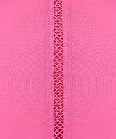 Close up of a seam, pink fabric texture.の写真素材