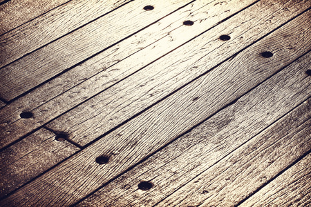 Sunset reflected on old, grunge wood panels, texture or background.の写真素材