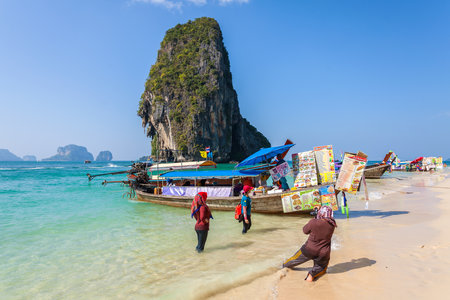 Railay, Thailand - January 02, 2015: Boat food stalls on Railay beach, one of the most scenic beaches in Thailand.のeditorial素材