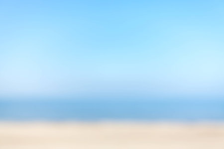 Blurred natural beach background, space for text.の写真素材