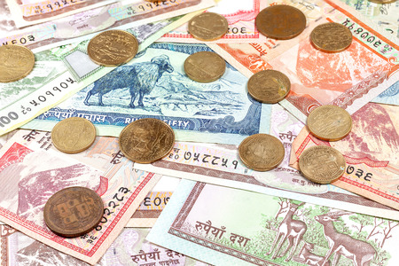 Money from Nepal, various Rupee banknotes and coins.の写真素材
