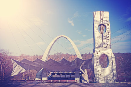 Szczecin, Poland - February 19, 2015: Retro filtered photo of a sculpture and amphitheater in Jan Kasprowicz Park, one of the most famous attractions in the city.のeditorial素材