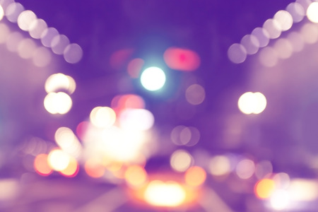 Blurred urban abstract background, city and traffic lights.の写真素材
