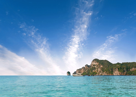 Beautiful island, nature background with clear water and blue cloudy sky.の写真素材