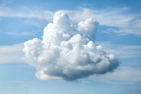 Unusual shaped cloud against the blue sky.