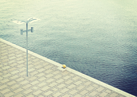 Retro filtered picture of an empty pier by the river.の写真素材