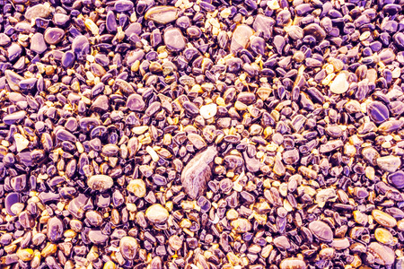 Vintage colors abstract nature blurred background or texture made of pebbles.の写真素材