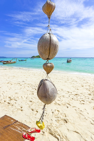 Coconut decoration on a tropical beach, summer background.の写真素材