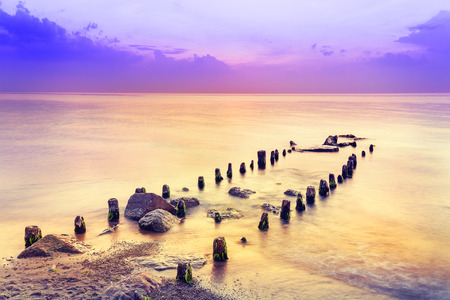 Beautiful sunset over Baltic Sea, Dziwnowek in Poland.の写真素材