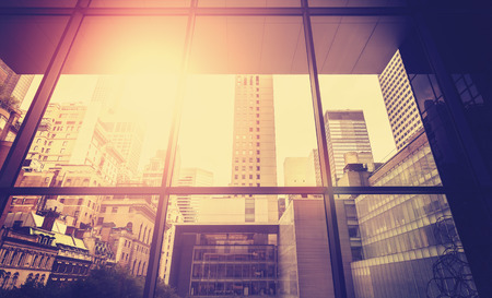 Vintage stylized picture of Manhattan with sun flare effect, New York City, USA.の写真素材