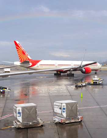 Newark, USA - September 13, 2015: Rainbow over Air India airplane at Newark Liberty International Airport (EWR), Airport is the largest hub for United Airlines (UA).のeditorial素材