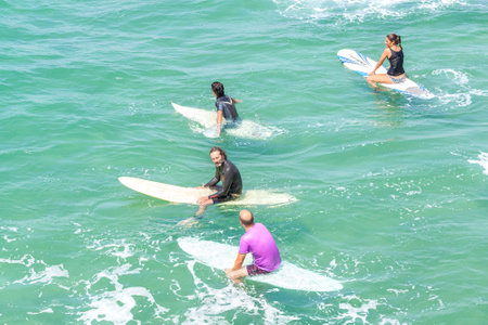 Venice, Los Angeles, USA - August 22, 2015: Surfers waiting for waves on a beautiful sunny day.のeditorial素材