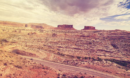 Vintage stylized stormy sky over Canyonlands National Park, Island in the Sky district, Utah, USA.の写真素材