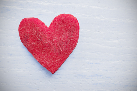 Retro stylized heart made of beet on grunge background, space for text.の写真素材