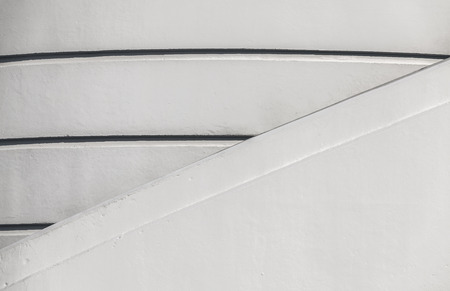White wall with regular shapes, background or texture.