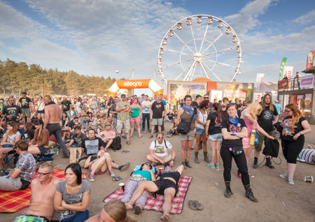 Kostrzyn nad Odra, Poland - August 1, 2015: People waiting for concert in front of main stage on the 21th Woodstock Festival Poland (Przystanek Woodstock).のeditorial素材