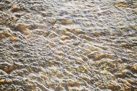 Blurred abstract natural background, shallow creek.の写真素材