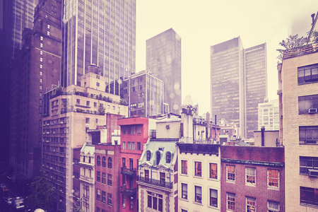 Vintage stylized photo of Manhattan Midtown buildings on a rainy day, New York City, USA.の写真素材