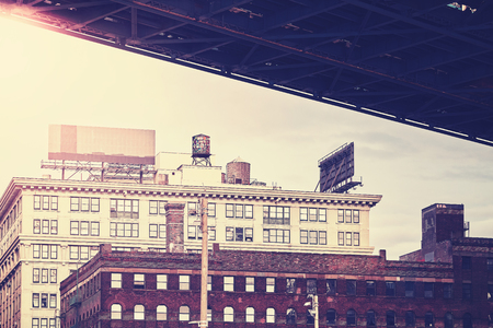 Under Manhattan Bridge, retro stylized Dumbo neighborhood, New York City, USA.の写真素材
