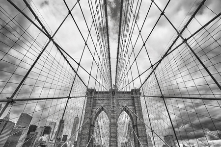 Wide angle black and white picture of Brooklyn Bridge, New York City, USA.の写真素材