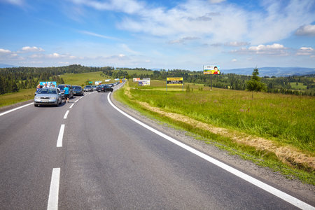 Bukowina Tatrzanska, Poland - June 15, 2017: Traffic jam on a road to Tatra Mountains, popular tourist destination in southern Poland, close to the Slovak border.のeditorial素材