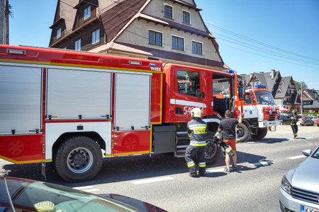 Bialka Tatrzanska, Poland - June 15, 2017: Firefighters rush to respond to emergency call during...