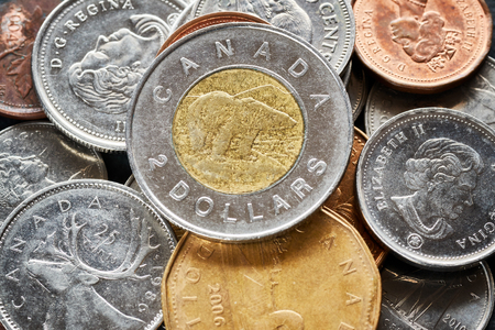 Close up picture of Canadian dollar coins, shallow depth of field.の写真素材