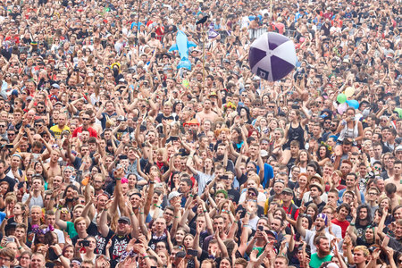 Kostrzyn, Poland - August 3, 2017: Applauding crowd at the 23rd Woodstock Festival Poland opening ceremony. Festival is among the biggest open air festivals in the world.のeditorial素材
