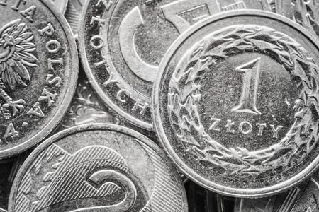 Extreme close up picture of Polish Zloty coins, shallow depth of field.