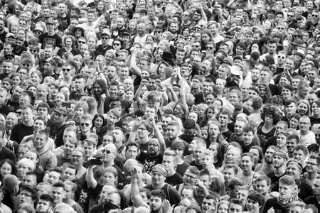 Kostrzyn, Poland - August 05, 2017: Applauding crowd at a concert during the 23rd Woodstock Festival Poland. Festival is among the biggest open air festivals in the world.のeditorial素材