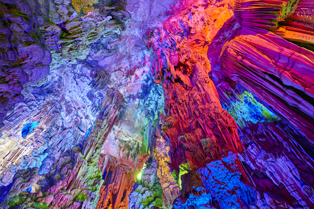 The Reed Flute Cave, natural limestone cave with multicolored lighting in Guilin, Guangxi, China.の写真素材