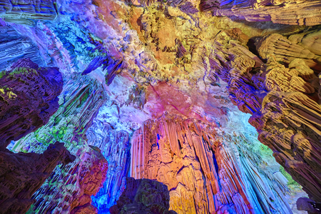 The Reed Flute Cave, natural limestone cave with multicolored lighting in Guilin, Guangxi, China.の写真素材