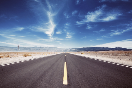 Death Valley desert road, travel concept, color toned picture, USA.の写真素材