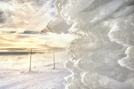Natural ice formation at sunset, abstract winter background, shallow depth of field.の写真素材