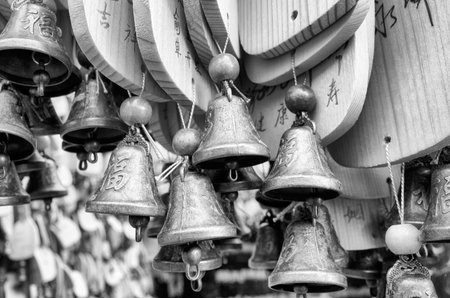 Lijiang, China - September 22, 2017: Prayers and wishes on wooden plates hanged in a temple by the White Water River in Blue Moon Valley.のeditorial素材