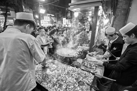 Xian, China - October 5, 2017: Street food preparation in the Muslim Quarter, well-known tourism site famous for its culture and food.のeditorial素材