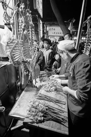 Xian, China - October 5, 2017: Street food preparation in the Muslim Quarter, well-known tourism site famous for its culture and food.のeditorial素材
