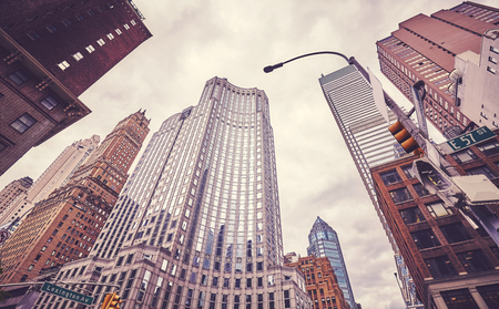 Retro cinematic style picture of skyscrapers at Lexington Avenue, New York City, USA.の写真素材