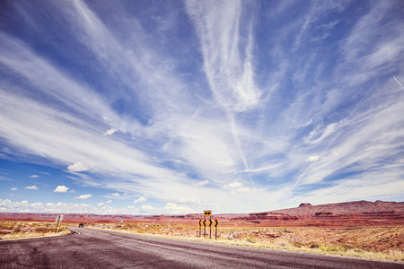 Vintage toned picture of U.S. Route 163, travel concept, USA.の写真素材