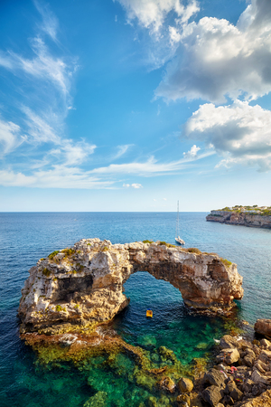Natural arch Es Pontas, one of Mallorca top attractions, Spain.の写真素材