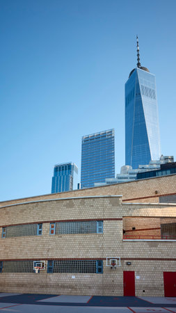 New York, USA - June 30, 2018: PS 234 Independence School basketball court with Freedom Tower in...