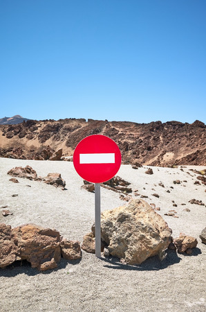 Mars like landscape with No Entry traffic sign, Mount Teide in background, Teide National Park, Tenerife, Spain.の写真素材