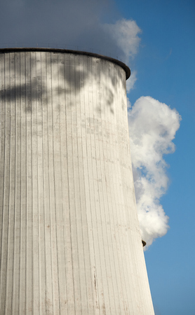 Close up picture of a smoking chimney, environmental pollution concept.の写真素材