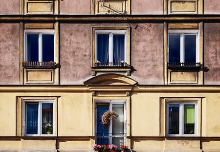 An old residential building facade, color toning applied.の写真素材