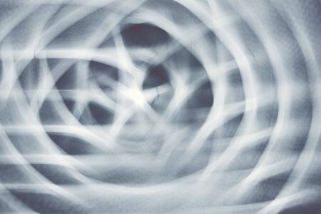 Motion blurred lights, abstract defocused background.