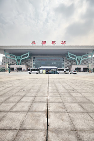 Chengdu, China - October 01, 2017: Police mobile force in front of Chengdu railway station modern building.のeditorial素材