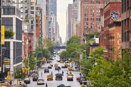 New York, USA - June 28, 2018: Busy 10th Avenue in the Chelsea neighborhood on a rainy day.のeditorial素材