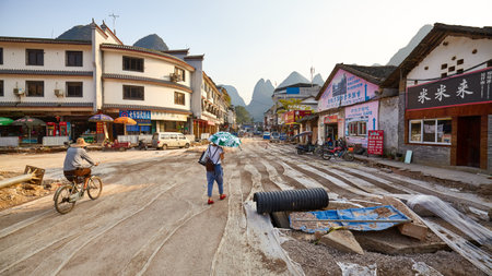 Xingping, China - September 18, 2017: Panoramic view of the town main road under construction.のeditorial素材